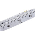 Soft Tape Measure With Dual Scale 60 Inch Vinyl Ruler For Sewing Tailor And Body Measurements, coiled with visible inch markings