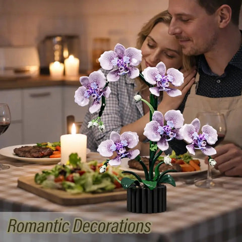 Couple dining with Purple Orchid Building Block Set With Vase, 619 Pieces, Phalaenopsis Floral Model Kit on table.