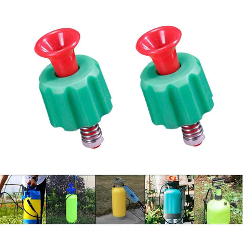 Two green plastic pressure relief valves with red push tops, close-up view for garden backpack sprayer connectors.