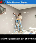 Person using High Strength Drywall Hole Repair Kit With Color Changing Spackling Compound 12 Oz Includes Putty Knife Patch and Sanding Pad