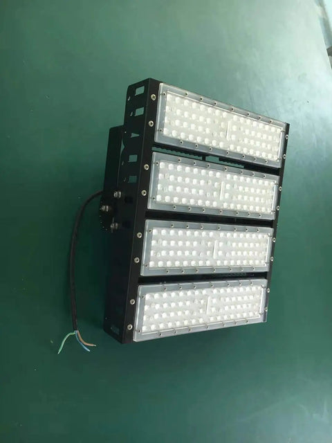 Heavy Duty 400W Led Tunnel Lights Built To Last For Outdoor Streets And Parking Lots Crisp Daylight White Glow Rock Solid IP65 Waterproof Floodlights on a green background.