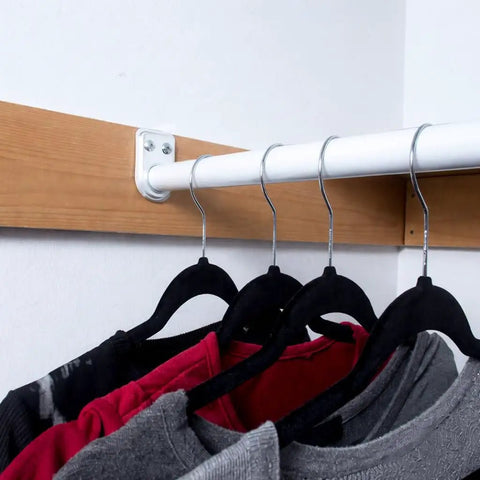 Adjustable Closet Rod 48 To 72 Inches White, Heavy Duty Steel Construction in corner with clothes hanging, holds up to 30 lbs