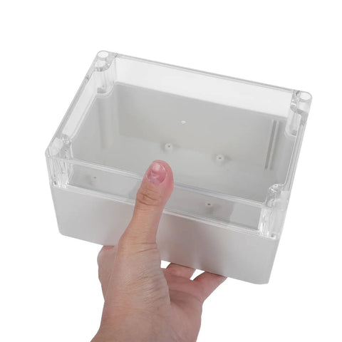 Weatherproof Outdoor Electrical Junction Box With Hinged Cover For Industrial Wiring And Control Systems Plastic Enclosure For No Fuss Tool Free Access Durable All Weather Wiring Box For Equipment Installation And Maintenance, clear lid in hand