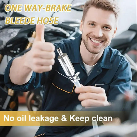 Smiling mechanic holding One Way Brake Bleeder Hose Kit With Built In Bleeder Valve in garage setting