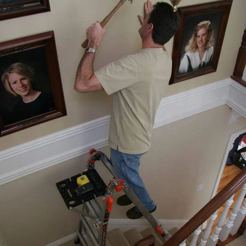 Person using Heavy Duty Project Tray Organizer With Paint Container Slots Magnetic Dish on ladder inside home