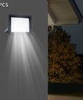 LED Work Light 100W 8000LM Flood Light Outdoor IP66 Weatherproof Plug in mounted on wall, casting bright light outdoors.