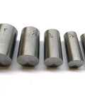 Five metal punches from Six Piece Disc Cutter Set with High Carbon Steel Punches and Cutter Block Hammer Operated for Sheet Metal