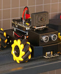 AI robot kit for STEM education with mecanum wheels and camera on a shelf.