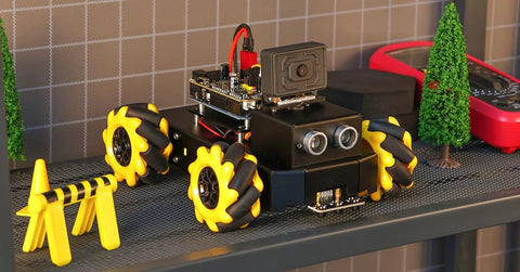 AI robot kit for STEM education with mecanum wheels and camera on a shelf.