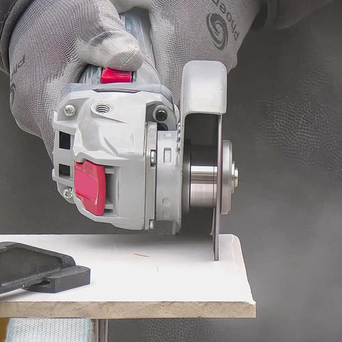 Heavy Duty Quick Change Adapter Links Threaded Blades Directly for Rock Solid Grinding, with angle grinder and steel disc in use.