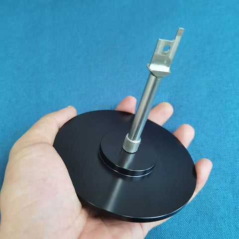 Hand holding Aluminum Alloy Suction Cup Adapter for Reciprocating Saws Saber Saw Curved Saw Tools Attachment