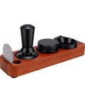 51mm Espresso Distributor And Tamper Set With Spring Loaded Action, wooden base with black tamper, funnel, and puck screen.