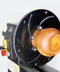 Self Centering 12 Inch Wood Lathe Chuck With 1 Inch 8 TPI Thread Direct Mount holding wooden piece, expanding and compressing view