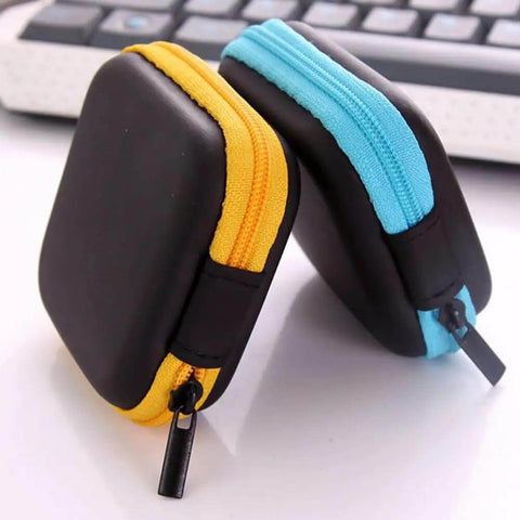 6 Pack Tough As Nails PU Hard Shell Earbud Cases Small Square Zipper Carry Pouches in black with yellow and blue zippers.