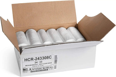 Heavy Duty Clear Trash Bags 1000 Count 12 To 16 Gallon Size 24 By 33 Inch Coreless Rolls in an open cardboard box.