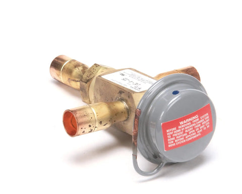Close-up of Compact Fridge OEM Replacement Part With 270 Cubic Inches Of Capacity, head pressure control component.