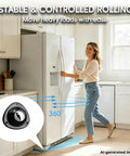 Black Self Adhesive Caster Wheels Four Pack Low Profile Swivel Rollers used for moving a refrigerator easily in a kitchen.