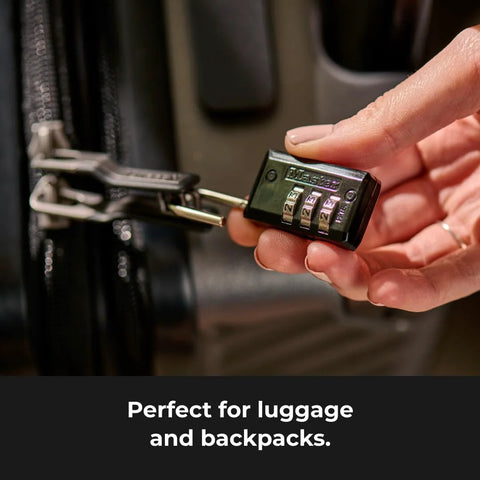 Master Lock black combination padlock with four-number dials, close-up view on a locker.