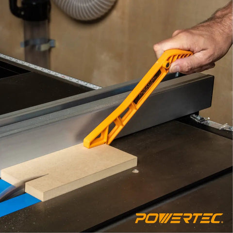 Magnetic Push Sticks Table Saw Router Table And Jointer Safety Gear Dual Ergonomic Handles, heavy duty pusher in use guiding wood.