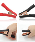 Beefy Insulated Alligator Clips Kit, 10 Pieces, showing red and black durable metal clips, spring loaded jaws in hand, 100 Amp.