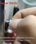 Hand applying 40 Pack Cable Clips With Strong Adhesive Tape For Wire Organization And Cord Management In Car, Office, And Home White Upgraded Nylon Clips for adhesion test.