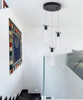 Black Finish 3 Light Pendant Lights For Kitchen Island And Dining Room, bubble cylinder design hanging in modern stairwell