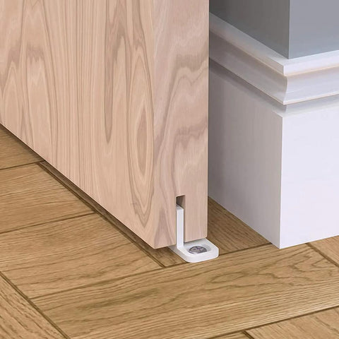 4 Pack POM Plastic T Shape Adjustable Sliding Barn Door Floor Guides with Screws White Finish installed under wooden door