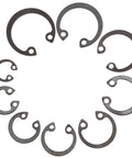 100 Piece External Snap Ring Set For Shafts And Machinery Sturdy Steel Circlips arranged in a circle, various sizes visible