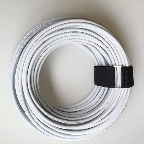 Coiled cable secured with Six Pack 18 Inch By 2 Inch Nylon Heavy Duty Reusable Hook And Loop Cinch Straps For Cable Bundling And Securing Heavy Objects In Home Garage Shop Black.