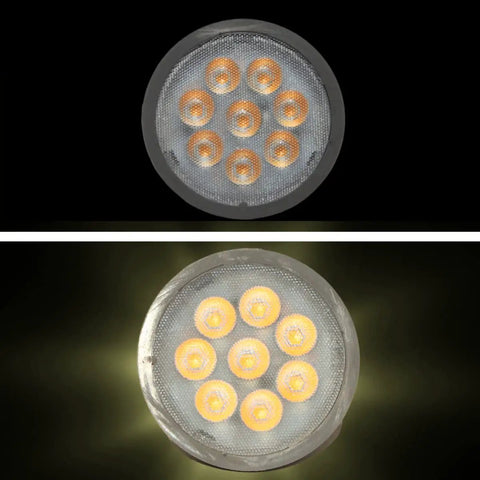 Top view of Hot 6.5W LED MR16 Bulbs Pack Of 12, 2700K Warm White, 500 Lumen Output, multiple bulbs lit, GU5.3 base visible