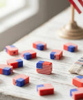 All American Flag Polymer Clay Beads Pack for DIY Jewelry Making, showing double-sided USA flag beads on a table 