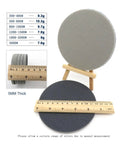 Six Pack 5 Inch Sponge Sanding Discs With Peel And Switch Backing For Easy Swap And Dust Vent Holes To Keep Your Workspace Clean While Polishing Or Grinding Wood Metal Or Plastic At Any Grit Level. Gray sanding disc on a ruler showing size.