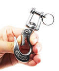 Rock Solid 304 Stainless Steel Swivel Eye Lifting Hook With Safety Latch And Smooth 360 Spin Rust Proof Rigging Gear Rated For 650 Kg Loads held in hand.