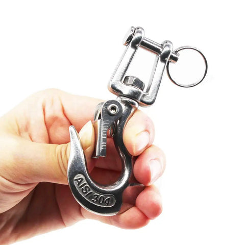 Rock Solid 304 Stainless Steel Swivel Eye Lifting Hook With Safety Latch And Smooth 360 Spin Rust Proof Rigging Gear Rated For 650 Kg Loads held in hand.
