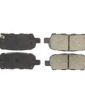 Centric Premium rear ceramic brake pads set, four-piece, shown with backing plates and friction surfaces.