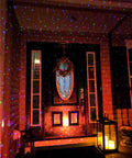 Outdoor Christmas Laser Projector Lights With Remote Control RGB firefly motion effects illuminating a porch with red, green, blue beams.