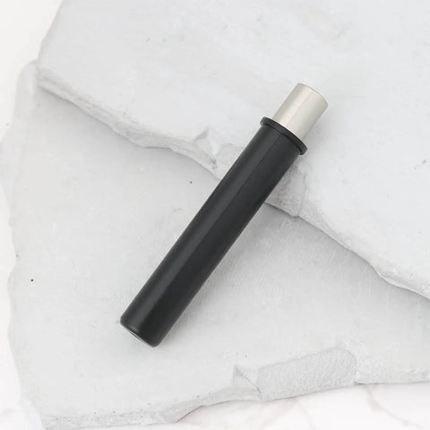Smooth As Butter Soft Close Hydraulic Dampers No Slam Gas Struts For Kitchen Drawers Bathroom Vanities And Trash Lids Quiet Reliable Cabinet Hardware Kit black hydraulic damper on white stone background