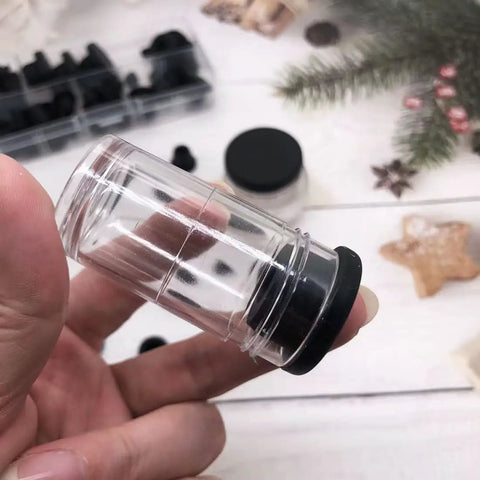 Close-up of a clear container with a black lid from the 50 Pack Silicone Rubber Hole Plugs Set With 6 Sizes T Type Stoppers