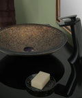 Cascade Waterfall Vessel Faucet With Single Lever Handle, Oil Rubbed Bronze Finish next to a decorative vessel sink