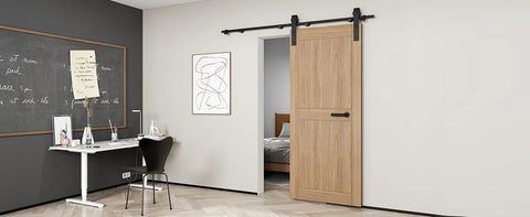 Interior view of 6.6ft Sliding Barn Door Hardware Kit with heavy duty steel rollers and flat tracks, installed on a wooden door.