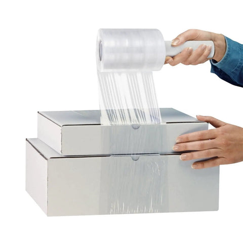 Person using Snag This Gotta Have 6 Roll Stretch Wrap Film Set With Premium 80 Gauge Cling Plastic on stacked boxes.