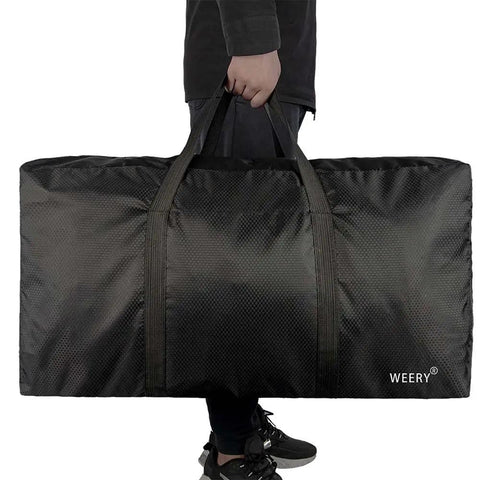 Person carrying Roomy 96L Duffle Bag For Men And Women Foldable Waterproof Travel Gear Rugged Honeycomb Nylon Build Black