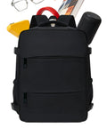 Black carry-on friendly hiking backpack with expandable capacity opens flat for easy packing at security passes quick through checkpoints