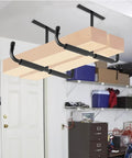 Heavy Duty Ceiling Storage Hooks For Garage Set Must Have, Overhead Rack To Hang Lumber, Ladders, Pipes, Fishing Rods, Bikes And Gear, Space Saving J Hooks, 2 Pack, Sturdy Ceiling Mounted Organizer installed with lumber