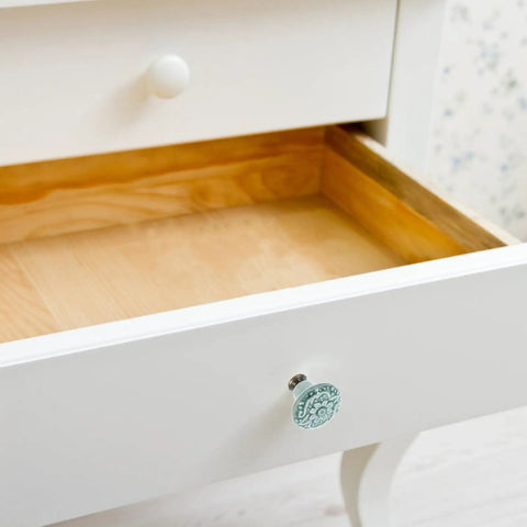 Six Piece Vintage Ceramic Cabinet Knob Set In Sky Blue on white drawer with one hole mount, showing antique round drawer pull.