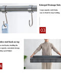 Movable Mop And Broom Holder In Stainless Steel With Drainage Basin, close-up of hooks and hands holding rack, heavy duty organizer.