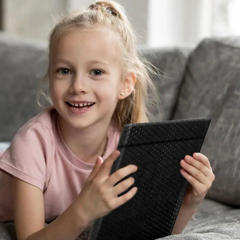 Child holding Padded Bubble Mailers 5 By 8.6 Inches, 50 Pack Self Seal Envelopes with Extra Thick Padding, Black, on couch
