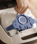 Hand inserting AirClean 3D Efficiency Dust Bags Type GN Allergy XL Pack With 2 Pre Motor Filters And 1 HEPA Filter for Miele Vacuum