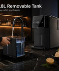 Countertop Nugget Ice Machine 33 Lbs Quick Freeze Cycle Producing Soft Chewable Squares With Hassle Free Push Button Start Self Drain Unit Brushed Steel Finish showing 1.8L removable tank filling with water on a marble countertop.