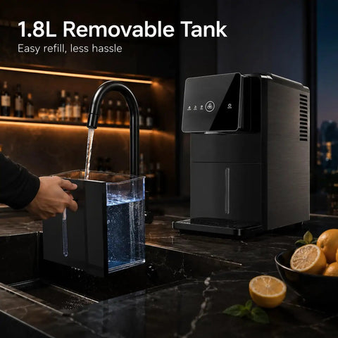 Countertop Nugget Ice Machine 33 Lbs Quick Freeze Cycle Producing Soft Chewable Squares With Hassle Free Push Button Start Self Drain Unit Brushed Steel Finish showing 1.8L removable tank filling with water on a marble countertop.